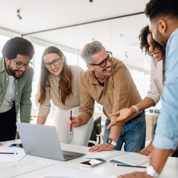 corporate professionals in a business meeting, engaged in teamwork and strategic planning
