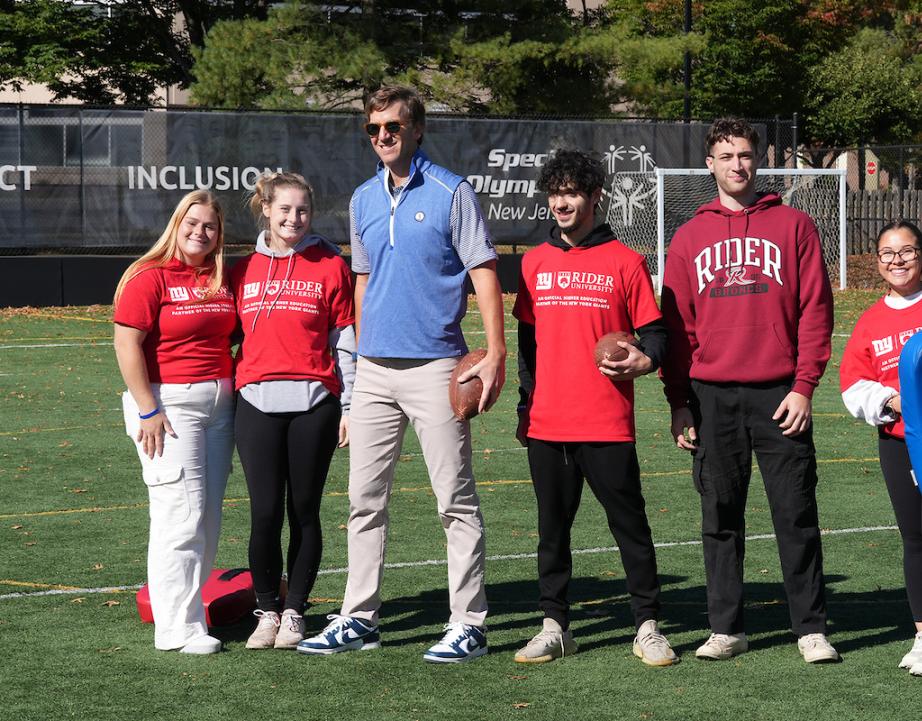 Eli Manning and students volunteer at the Special Olympics