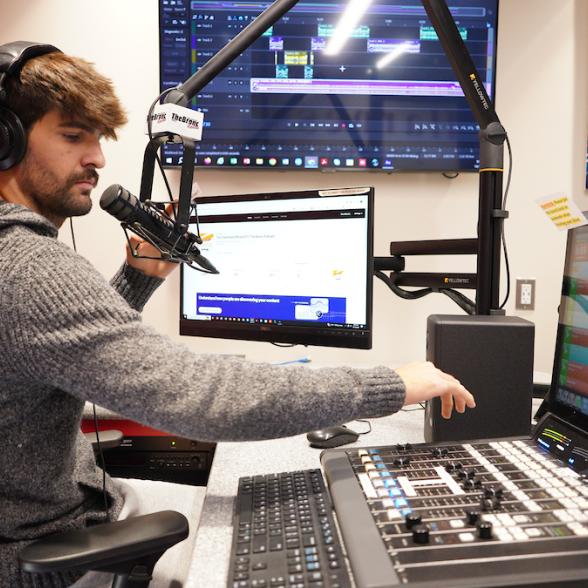 Student working in radio station